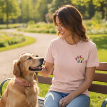 BFF Bark Boutique light peach t-shirt with a colorful floral paw print design on the left chest.